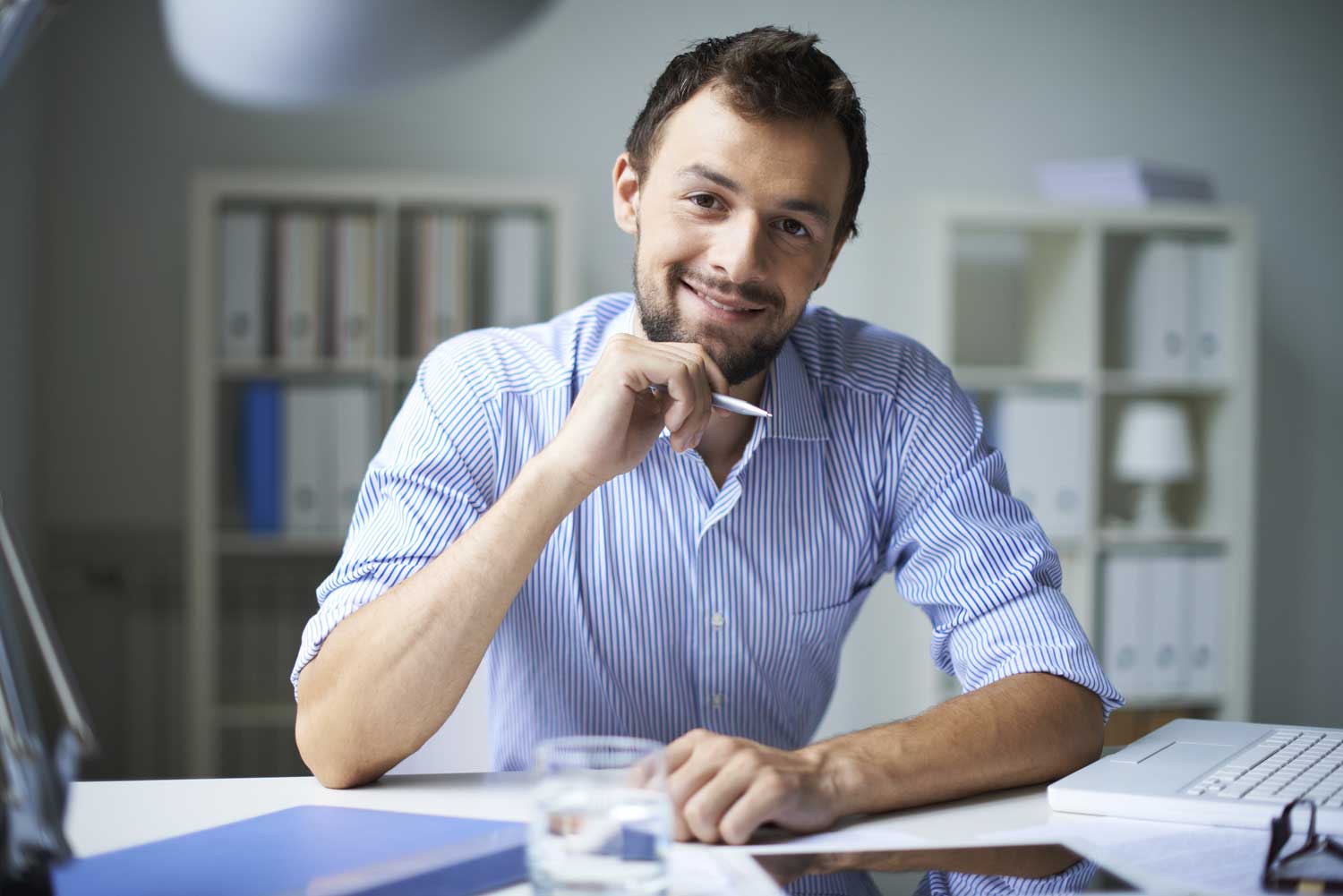 Thinking student at desk Thinking student at desk